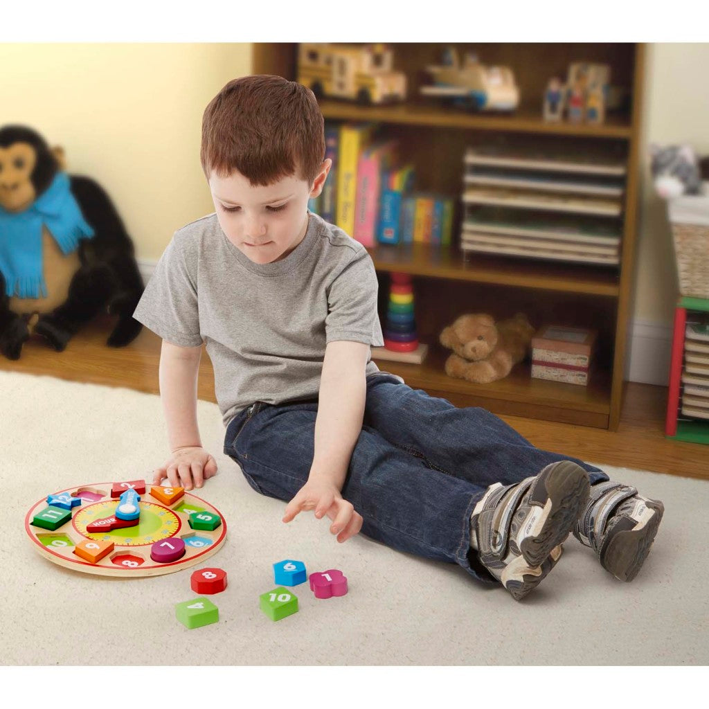 Horloge d'apprentissage en bois Melissa Doug avec 12 formes en bois