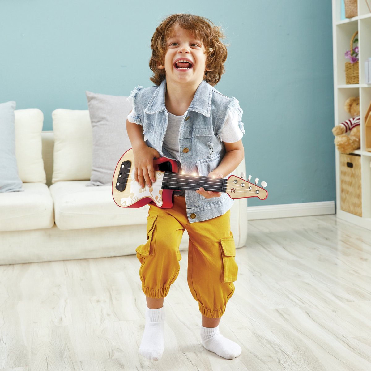 Hape ukulélé lumineux en cuir rouge - instrument de musique jouet pour enfants à partir de 3 ans