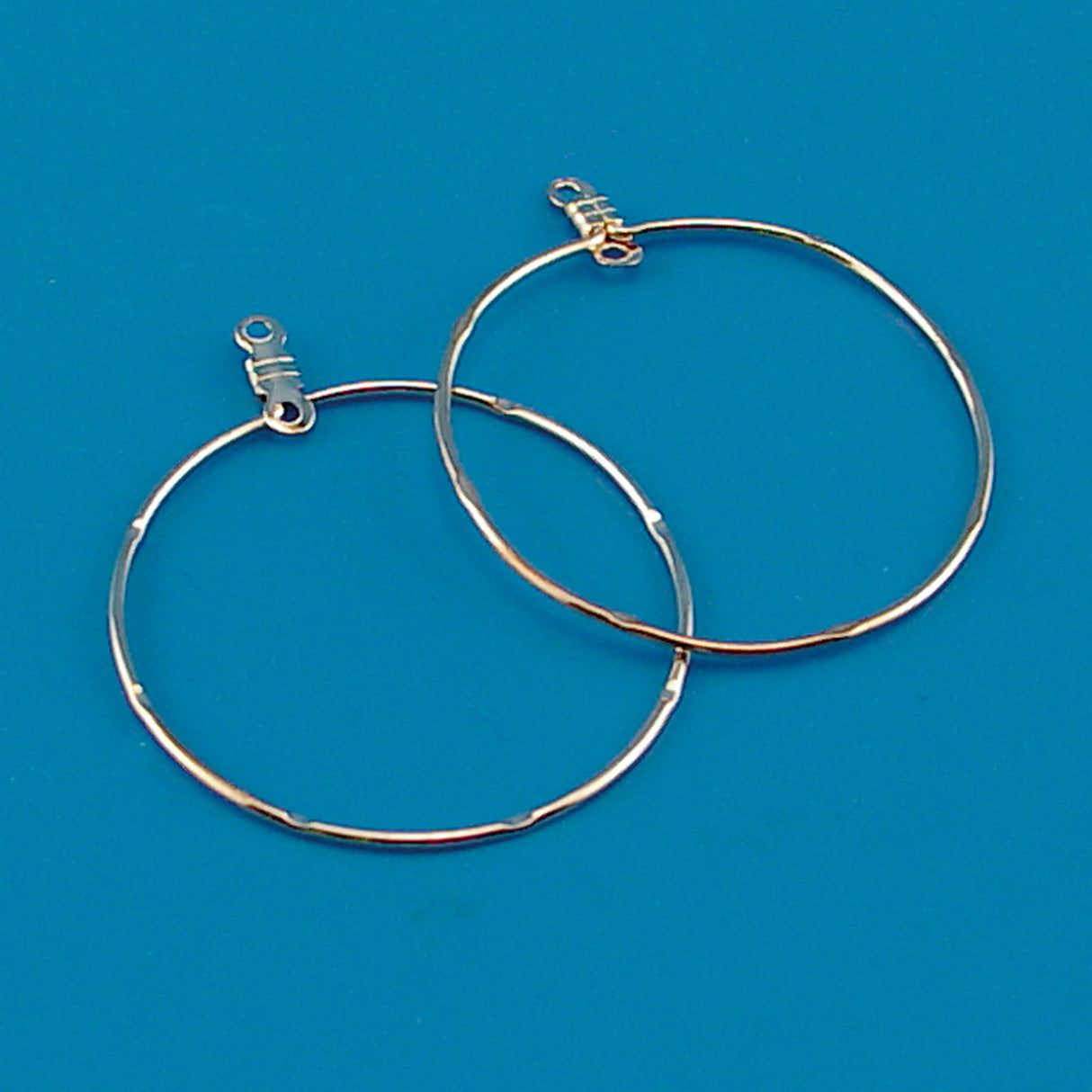 Darice • créole d'oreille acier doré