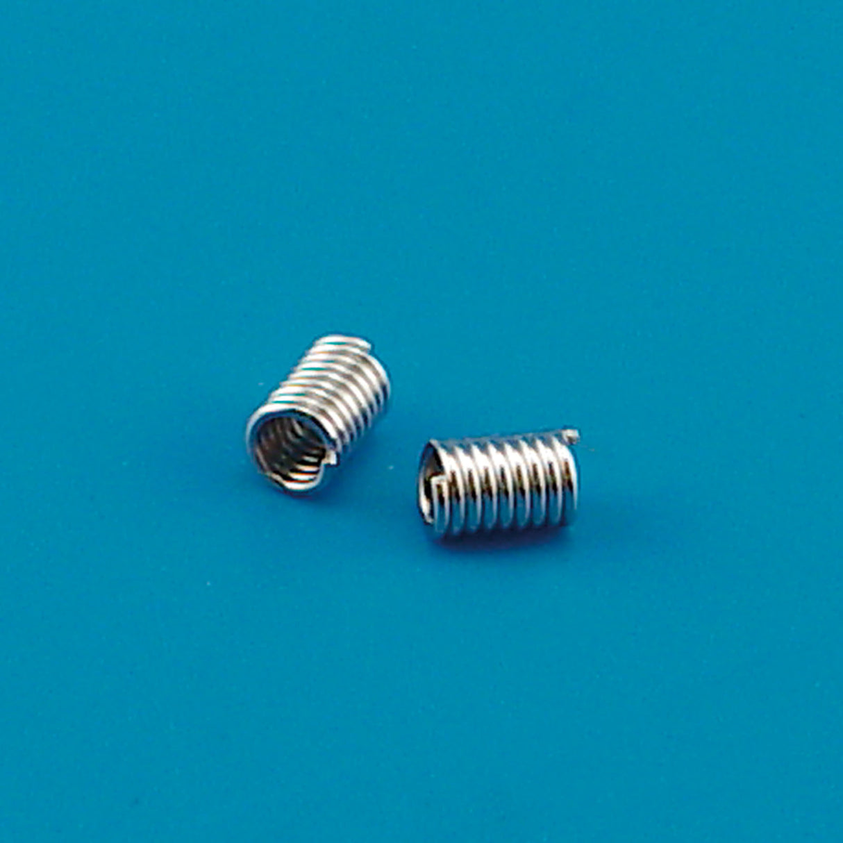 Darice • entretoise de bobine 18pcs 5x8mm argent