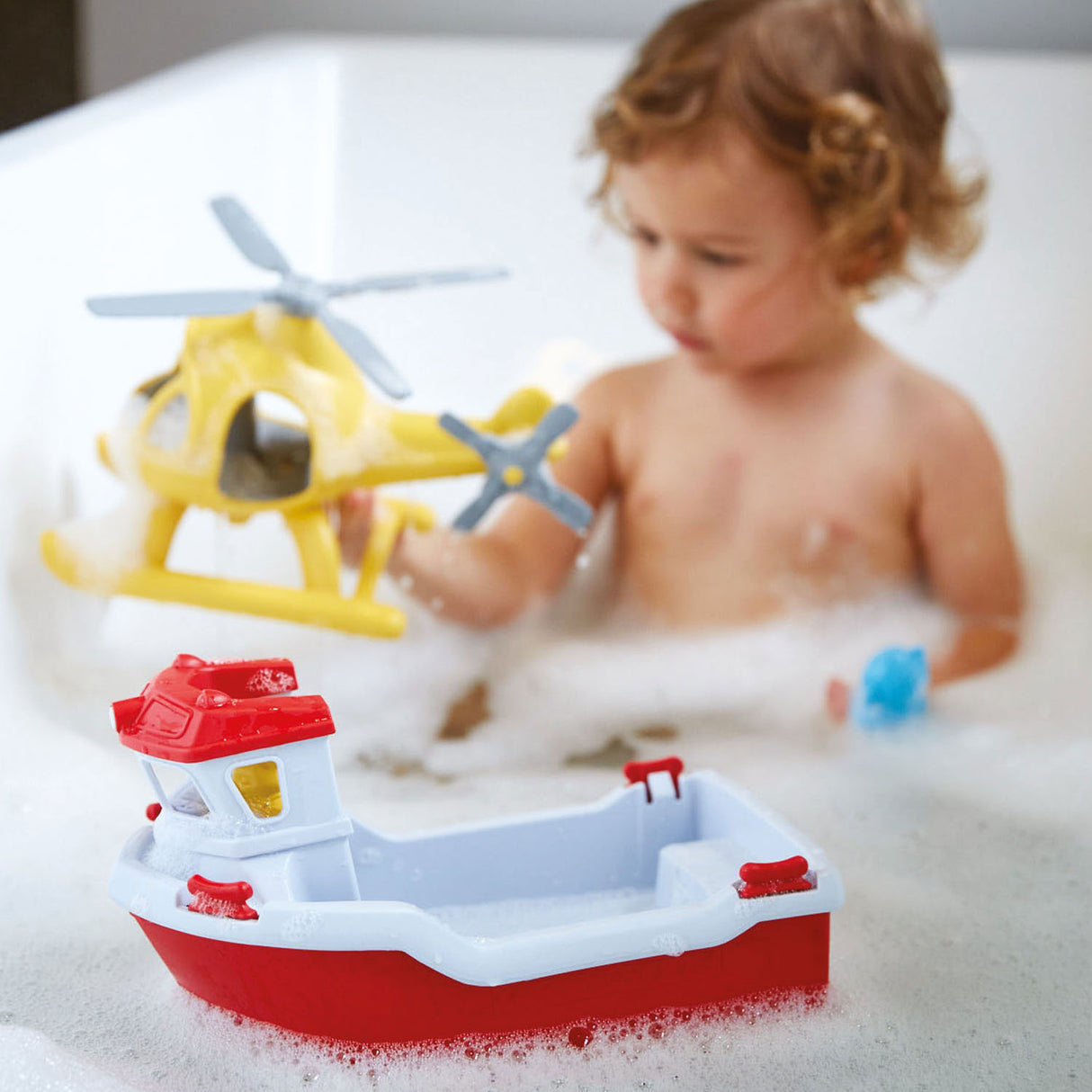 Board de sauvetage des jouets verts avec hélicoptère