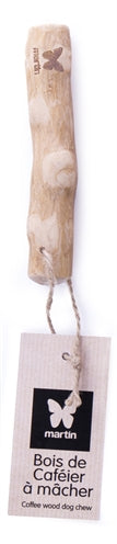 Martin mâchant du bois de caféier