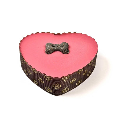Le yaourt de boulangerie aboiement surmonté d'un gâteau Pawty coeur rose avec une bougie