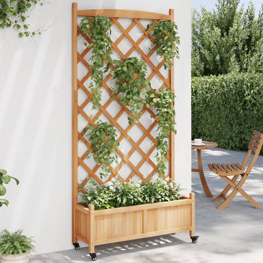 VidaXL Jardinière avec treillis et roulettes, bois de pin marron massif