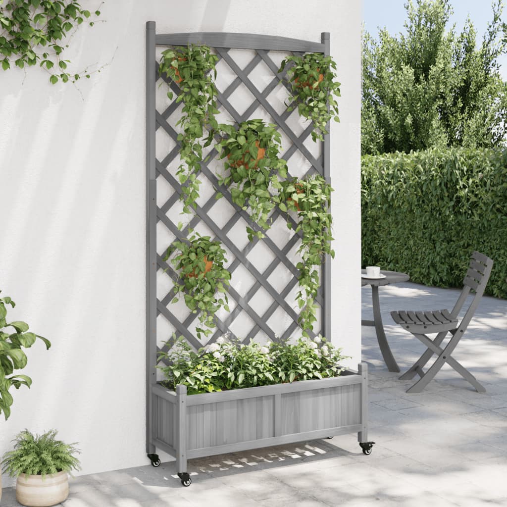 VidaXL Jardinière avec treillis et roulettes, bois de pin gris massif