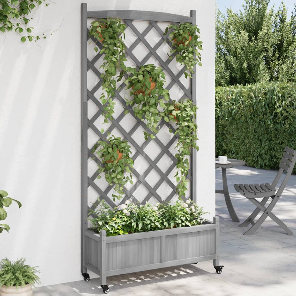 VidaXL Jardinière avec treillis et roulettes, bois de pin gris massif