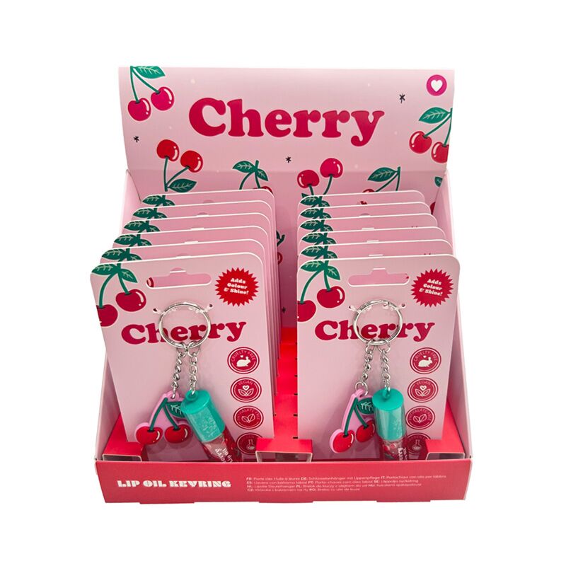 Porte-clés en bâton d’huile de lèvres cerise avec charme