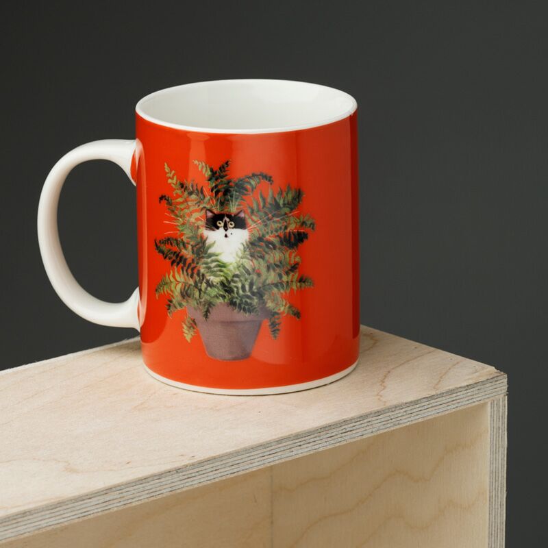 Kim haskins chat dans un pot de plante tasse en porcelaine rouge