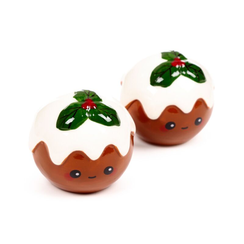 Offres gourmandes de pudding de Noël salières et poivrières
