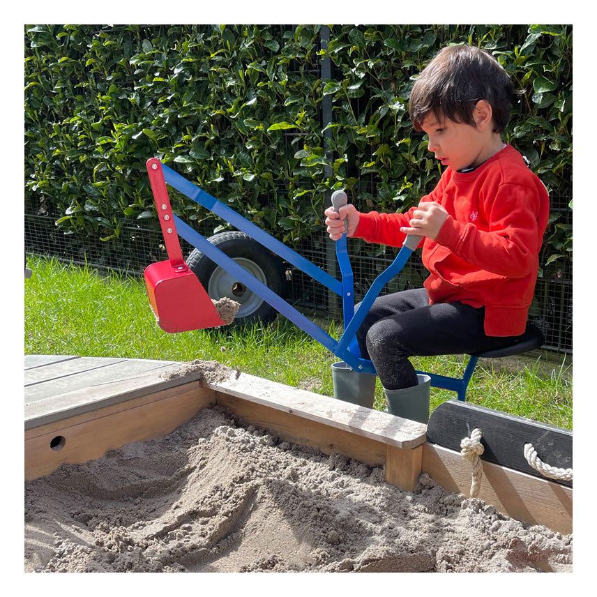 Petite excavatrice en métal de pied rouge