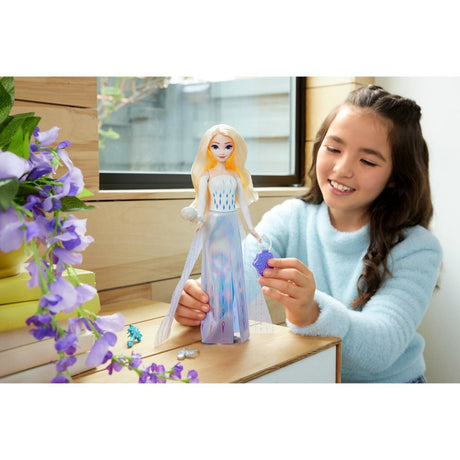 Transformez Disney La Reine des Neiges et découvrez la poupée Elsa - poupée mannequin