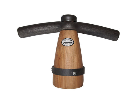 Le batteur à carrelage blanc bobine en bois déblanchit