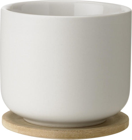Tasse Stelton Theo avec dessous de verre - sable