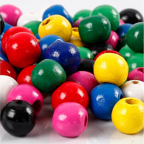 Perles en bois Creativ Company, d 10 mm, diamètre du trou 3 mm, env. 680 div, différentes couleurs, 230 g 1 boîte