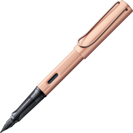 Stylo plume Lamy lx noble 076 – en aluminium léger de couleur or rose – avec finition en métal précieux et plume en acier PVD noir brillant, avec cartouche d'encre bleue T 10