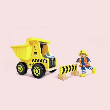 Camion benne Hape avec figurine en bois et barrière routière - véhicule de construction jouet à partir de 2 ans