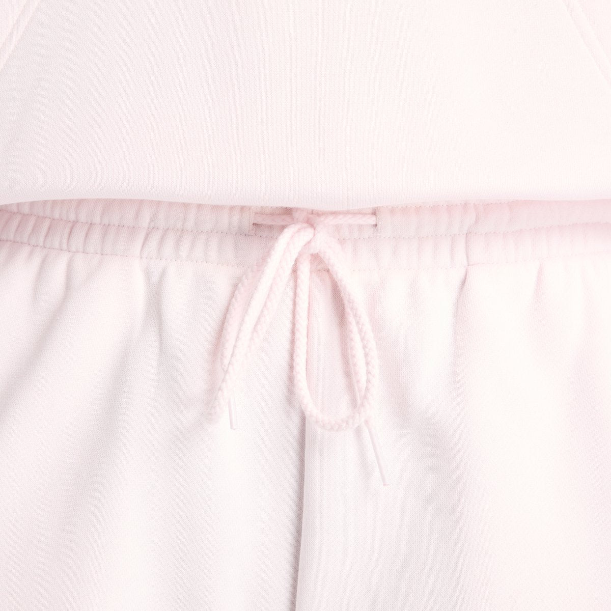 Pantalon de sport femme New Balance Sport Essentials French Terry Short - sel rose