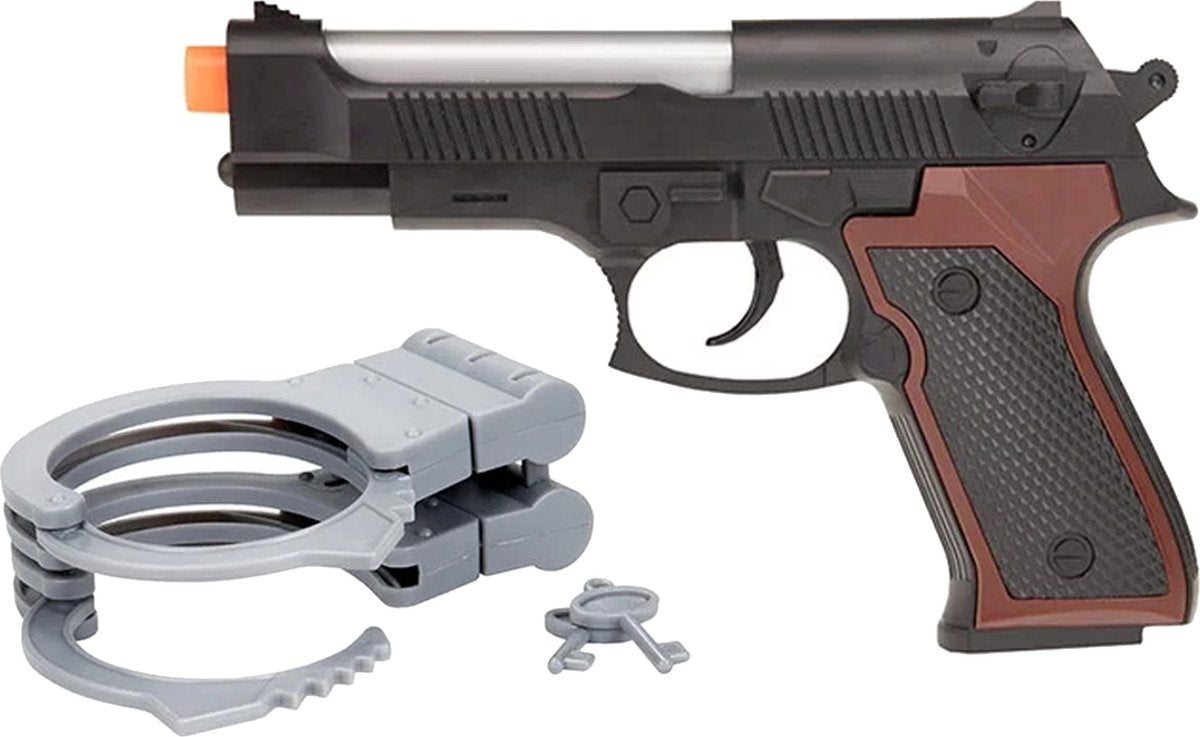 La police a mis des menottes et un pistolet avec lumière et son