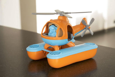Jouets verts hélicoptère de mer orange bleu