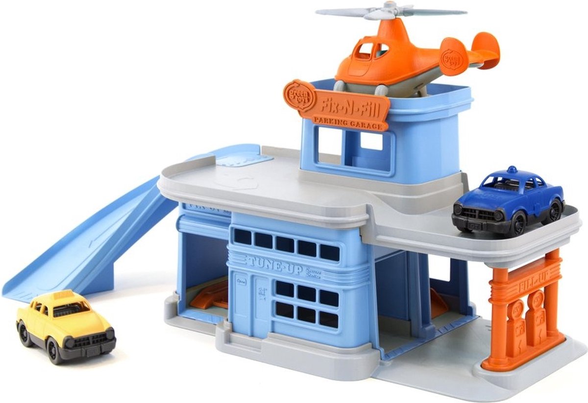 Parking pour jouets verts avec voitures et hélicoptères