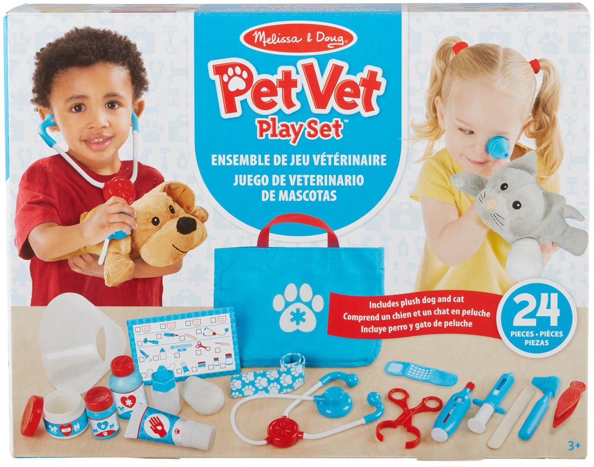 Melissa Doug examine l'ensemble de jeu vétérinaire pour animaux de compagnie