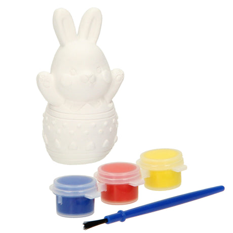 Un groupe d'artisanat créatif peint votre propre lapin de Pâques