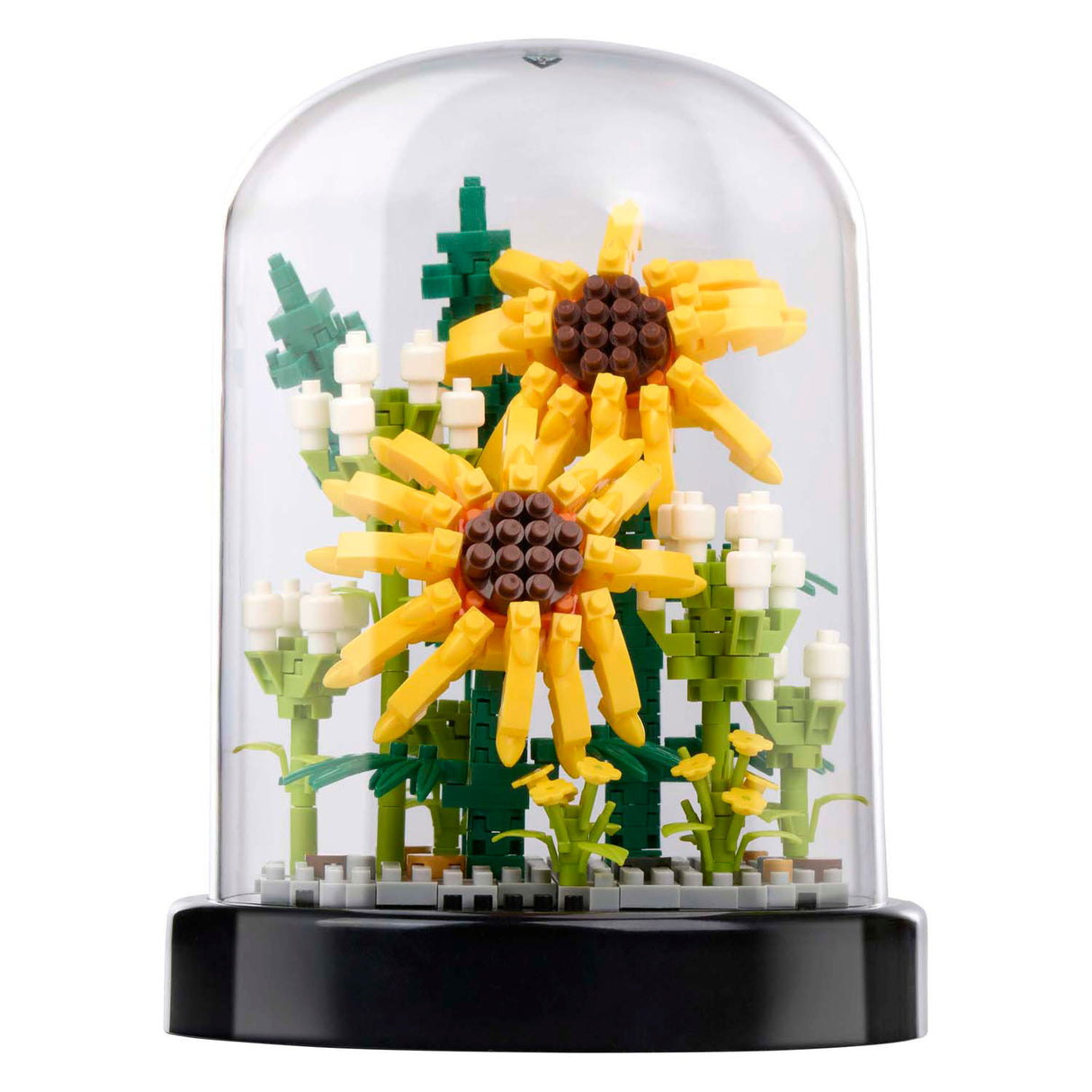 Blocs de construction de fleurs dans une cloche en verre