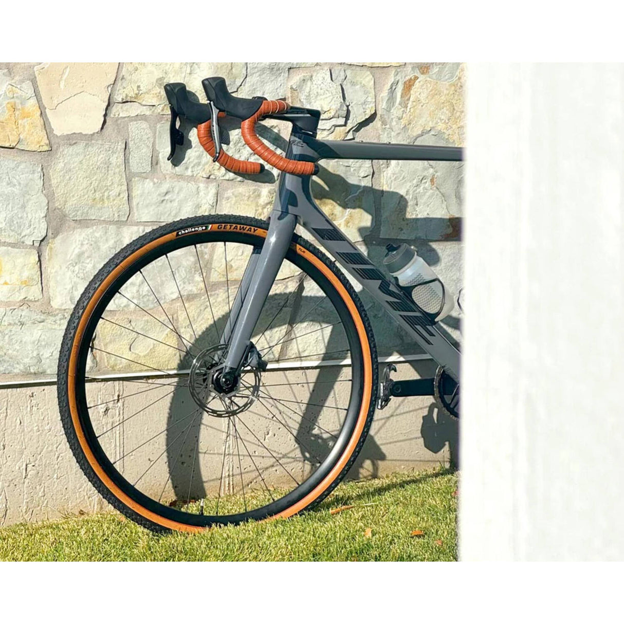 Challenge - escapade course pneu tlr 700x40c noir marron