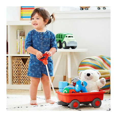 Chariot orange de jouets verts