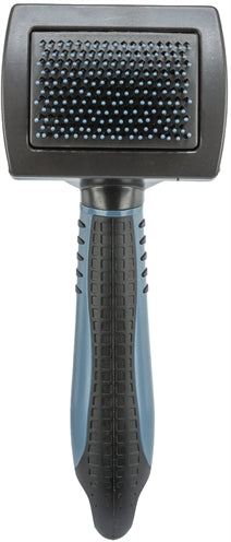 Brosse douce Trixie avec poils et picots en plastique