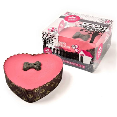 Le yaourt de boulangerie aboiement surmonté d'un gâteau Pawty coeur rose avec une bougie