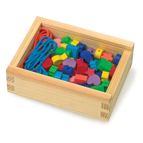 Small foot - perles à enfiler en bois, 84 pièces.