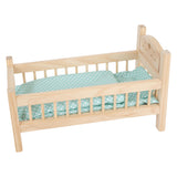 Small foot wooden doll bed of course with bedding, 4LDG.