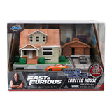 Jada joue au diorama de la maison de Jada Fast Furious Nano Dom avec des véhicules