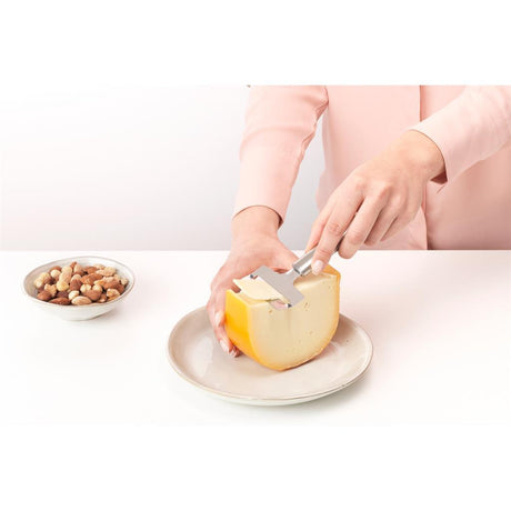 Trancheuse à fromage profilée Brabantia pour fromage jeune