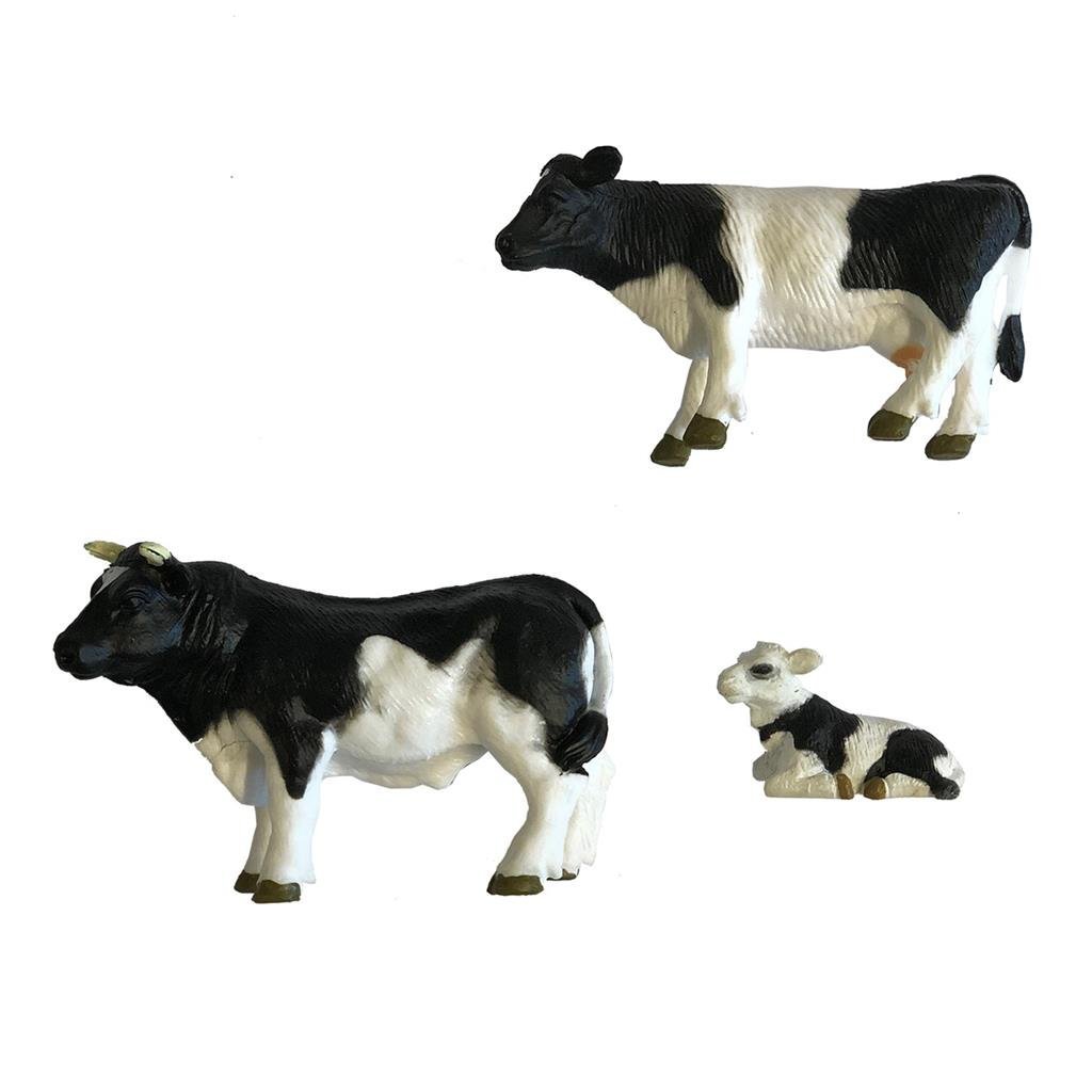 Taureau de ferme hollandais avec vache et veau