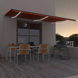 Vidaxl luifel extensible manuellement avec LED 600x300 cm orange et marron