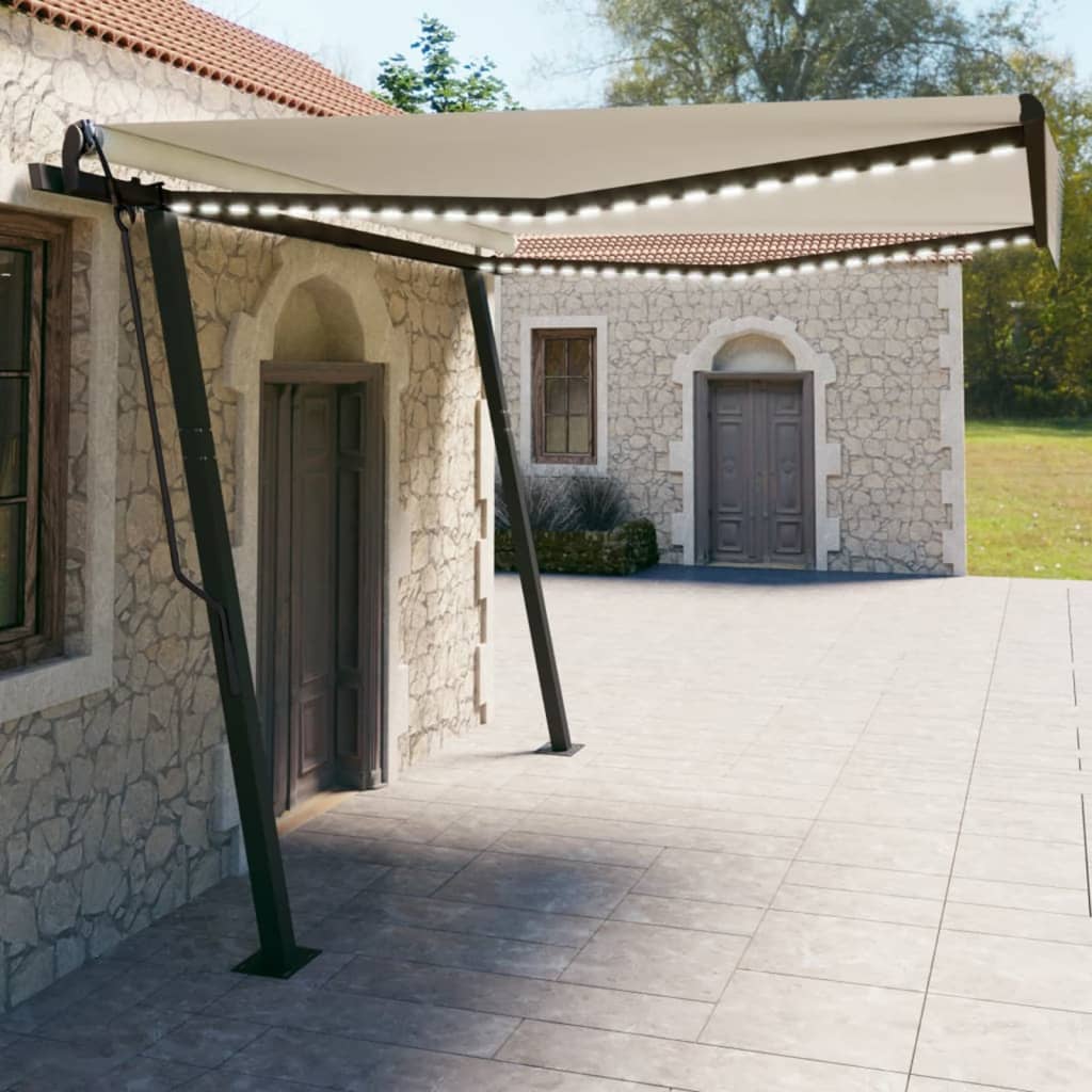 VidaXL Auvent extensible manuellement avec LED 4x3 m crème