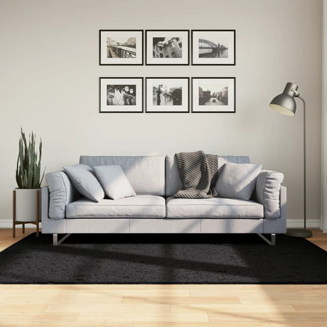 VidaXL tapis oviedo poils ras 140x200 cm noir