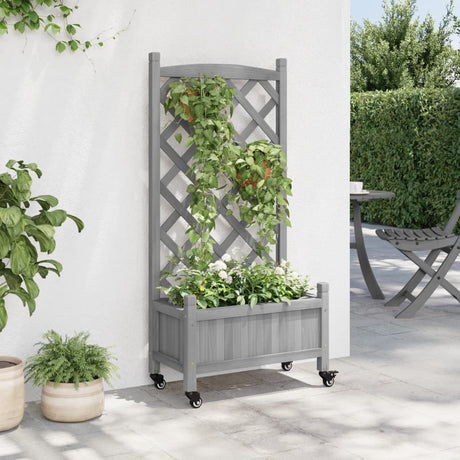 VidaXL Jardinière avec treillis et roulettes, bois de pin gris massif