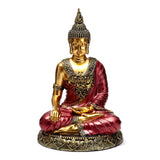 Contemplation du Bouddha thaïlandais en or rouge