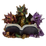 Lecture de bébé dragon triplet d'éléments