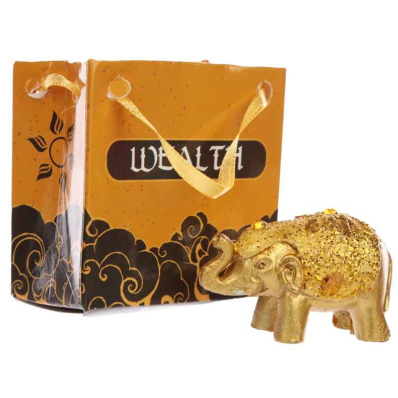 Mini éléphant porte-bonheur à paillettes métallisées dans un sac