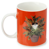Kim haskins chat dans un pot de plante tasse en porcelaine rouge