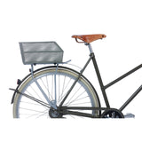 Basil Cento's bicycle basket on the back of Olive Green