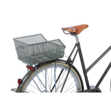 Basil Cento's bicycle basket on the back of Olive Green