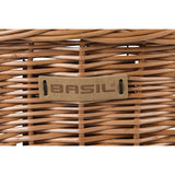 Basil Bremen Wicker KF bicycle basket in front of nature