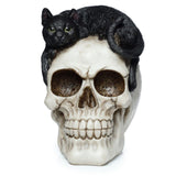 Accessoire de maison crâne avec chat noir