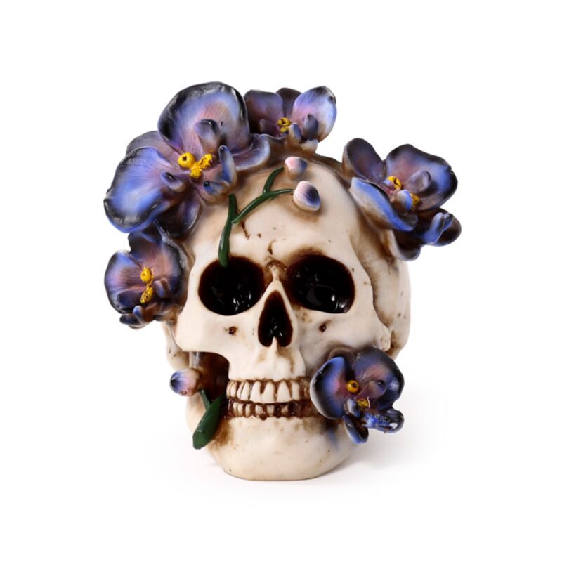 Crâne avec fleurs grimpantes violettes