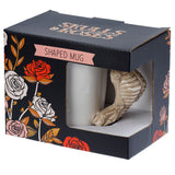Mug en céramique avec anse en forme de squelette